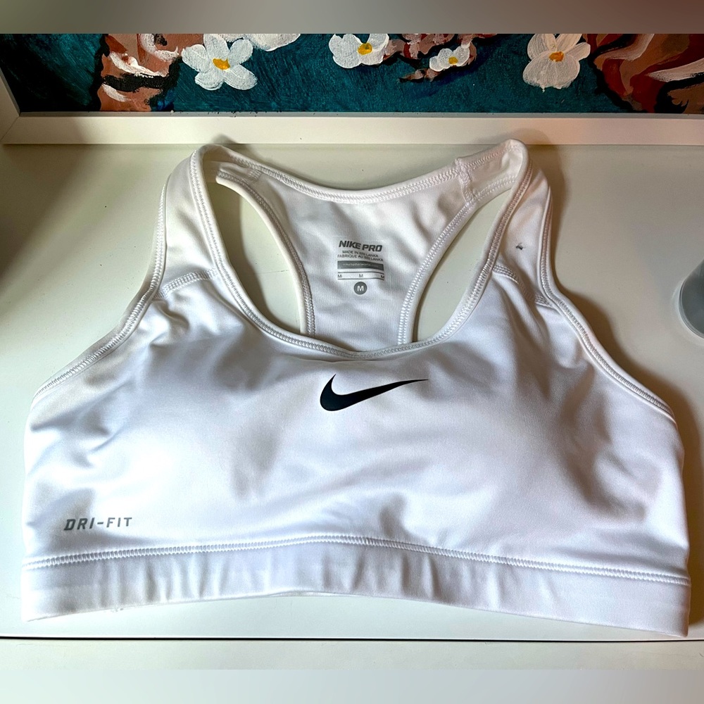Nike Pro - Sport Bra Dri-Fit. I wore it 3 times and then I grew bigger 🥲